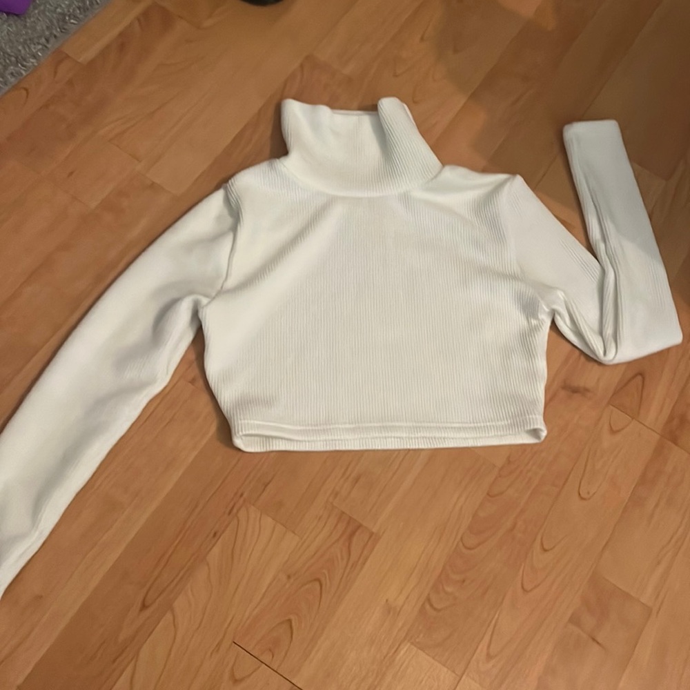 White ribbed turtleneck sweater